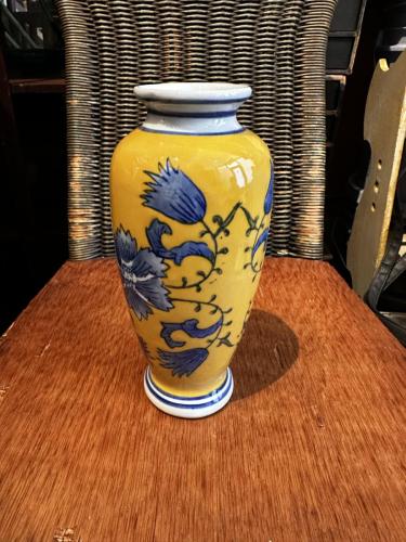 47.-Yellow-Vase-with-blue-flowers